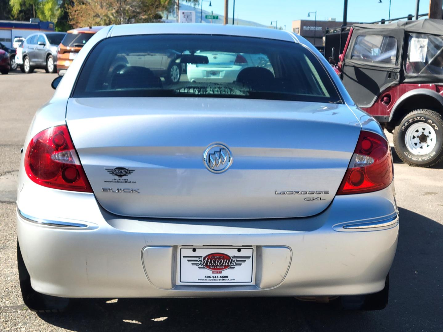 2009 Silver /Black Buick LaCrosse (2G4WD582091) with an 3.8L V6 engine, 5 Speed Automatic transmission, located at 450 N Russell, Missoula, MT, 59801, (406) 543-6600, 46.874496, -114.017433 - Really Nice Buick Sedan. 3.8L V6 Engine. Automatic Transmission. Leather Heated Seats. Air. Cruise. Tilt. Power Windows and Locks. Good Michelin Tires. Remote Start. Does have a Branded Title because of a clerical error in North Dakota so financing isn't available. - Photo#4